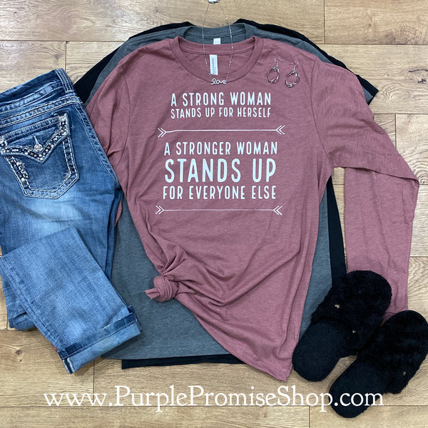 A strong woman stands up for herself. A stronger woman stands up for everyone else. [long sleeve]